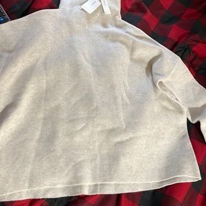 original price $375. Soft 66% wool , 27% cashmere, 6% nylon and 1% spandex.